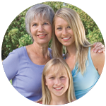 Grandmother, mother and daughter enjoying the outdoors.